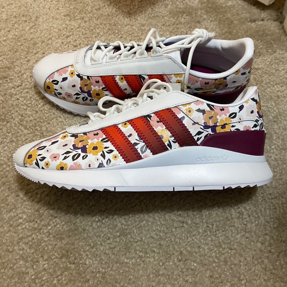 Womens adidas sneaks in size 10. Brand new with tags no box